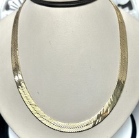  10K YELLOW GOLD HERRINGBONE NECKLACE 24 INCHES X 7MM