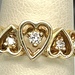 14K YELLOW GOLD RING WITH HOLLOW HEARTS AND DIAMONDSSIZE 5.5