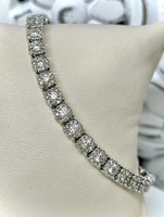  10K WHITE GOLD DIAMOND TENNIS BRACELET. 7 INCHES LONG