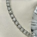  10K WHITE GOLD DIAMOND TENNIS BRACELET. 7 INCHES LONG