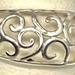  STERLING SILVER BAND WITH DOME SHAPED VINE DESIGN SIZE 8