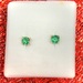  10K YELLOW GOLD STUD EARRINGS WITH ROUND GREEN STONES