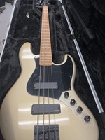 SQUIER JAZZ BASS-GOLD FLAKE W/SKB CASE.