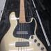 SQUIER JAZZ BASS-GOLD FLAKE W/SKB CASE.