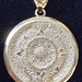 14K YELLOW GOLD MAYAN CALENDAR PENDANT
