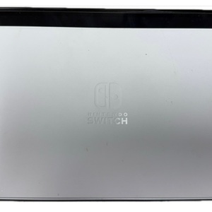 Nintendo Switch OLED with dock, controllers, and power cord