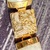  14K JADE LIKE BAR BRACELET WITH 14K YELLOW GOLD DRAGON ACCENTS 6 INCHES